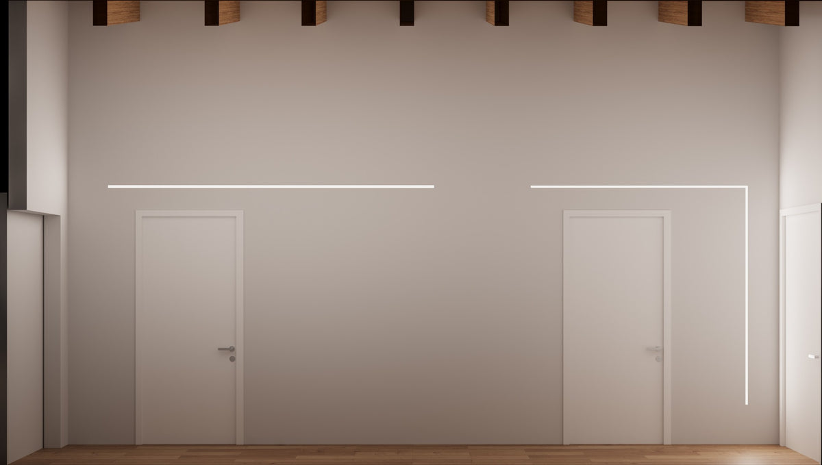 Prospetto del corridoio della zona notte con parete alta, porte complanari e luce lineare integrata