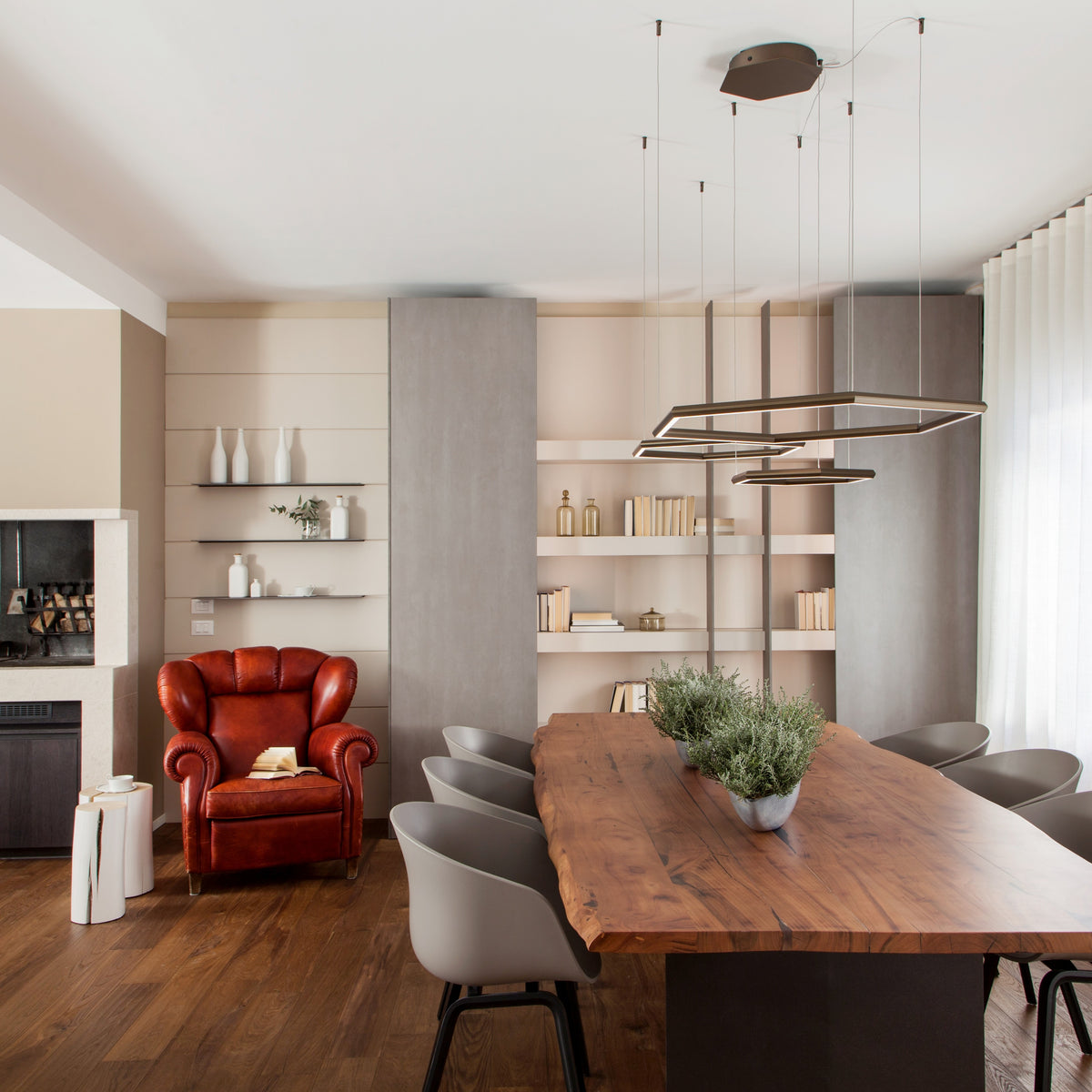 Casa contemporanea con eleganza classica e zona giorno con camino e area pranzo, progetto di interior design su misura ad Arzignano