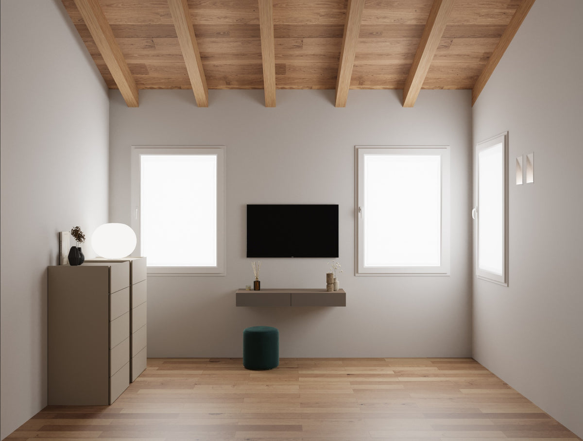 Render della composizione dai toni neutri in camera padronale con TV a parete, mensola sospesa, coppia di cassettiere e finestre
